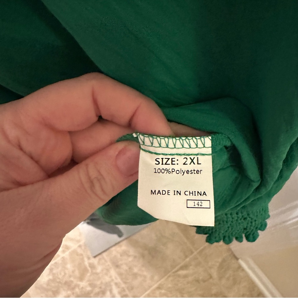 *New with Tags* Dokotoo brand oversized top. Size 2X blouse.  Green top. Flowy. - Picture 9 of 9